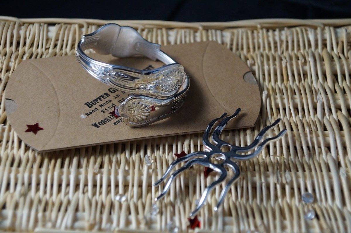 Cuff bracelet and spider pendant on a Buffergirl gift box