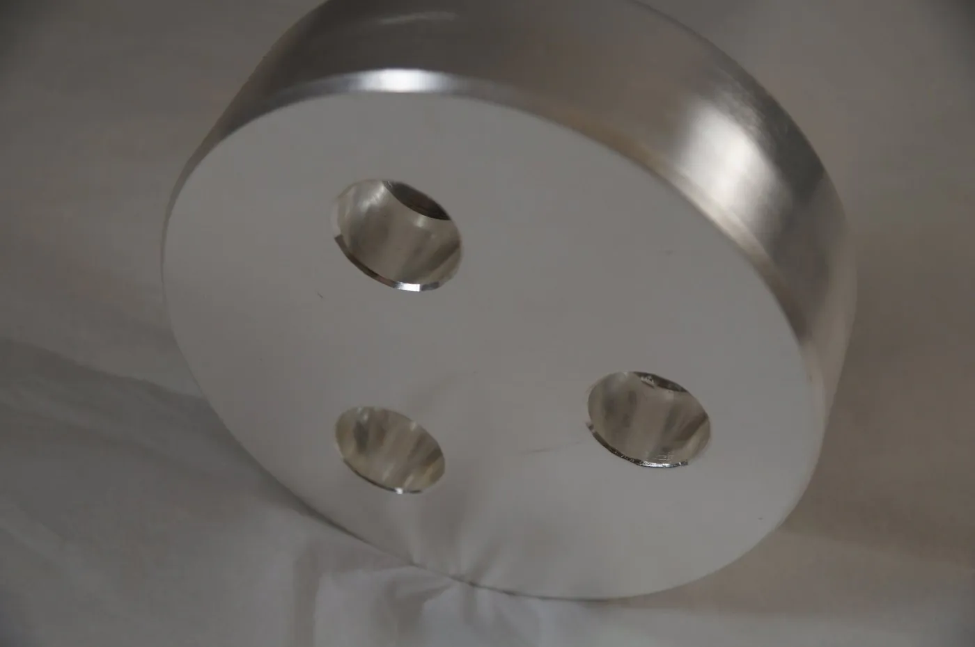 Plated component, angled view of the bored holes
